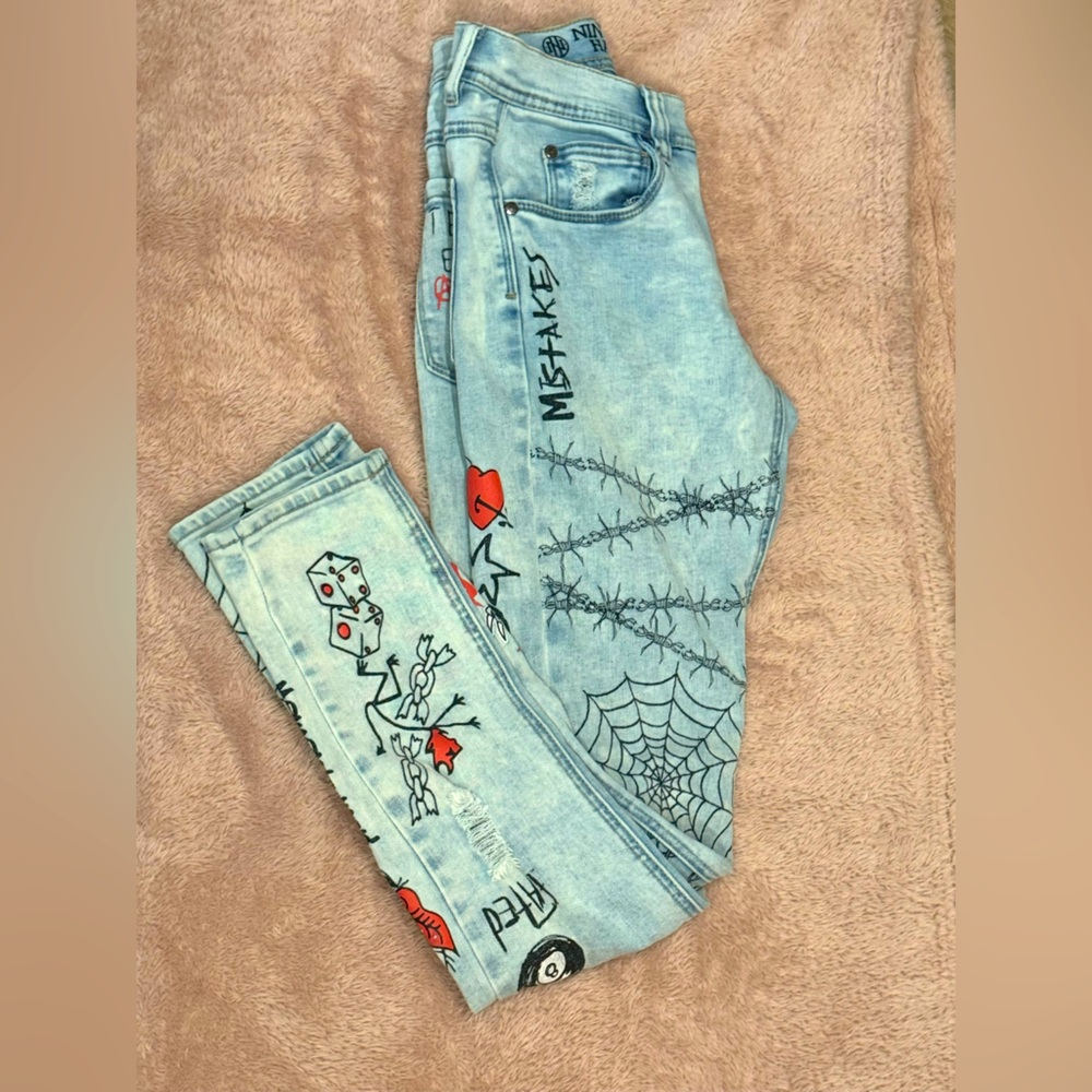 Graphic Light Blue Jeans with Web and Barbed Wire Design